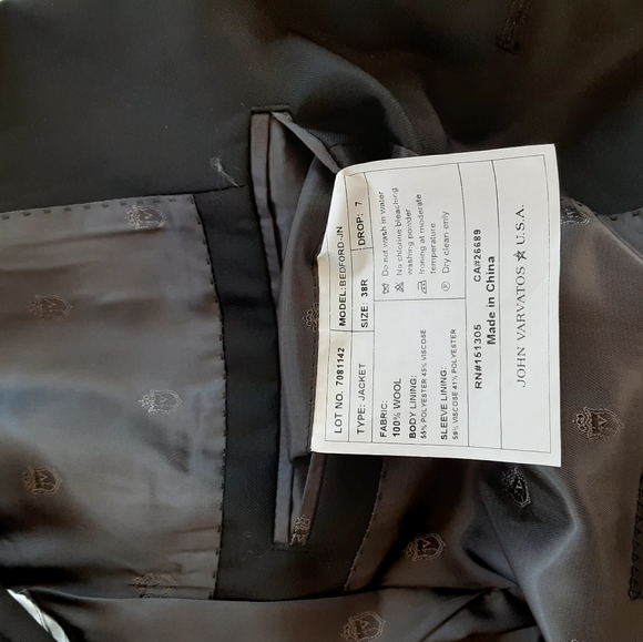 New, never worn John Varvatos USA black suit.